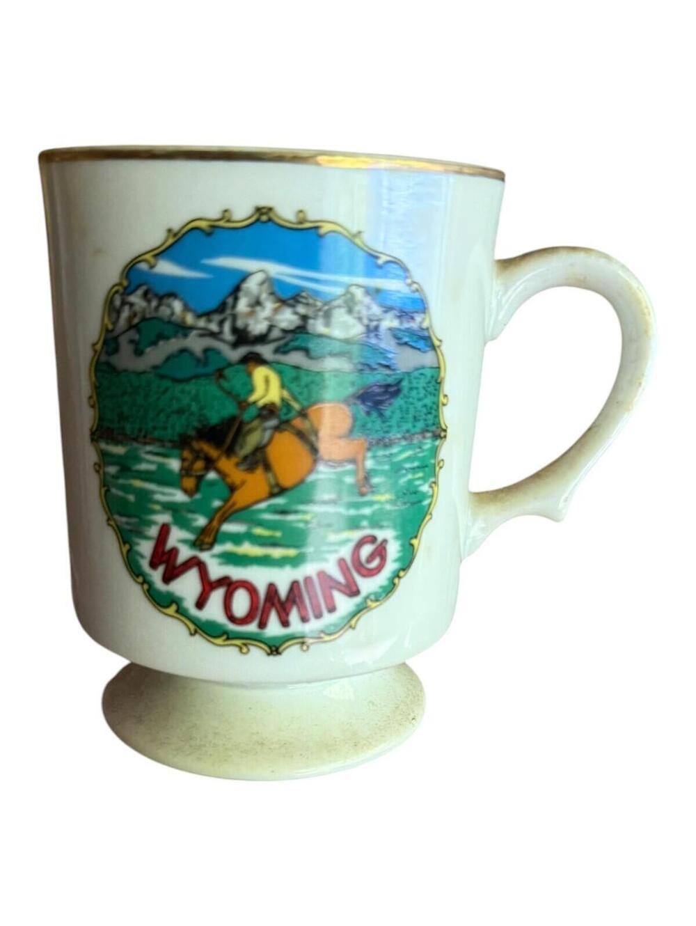 VTG Wyoming Souvenir Coffee Mug Horse Cowboy Graphics Gold Trim White Ceramic